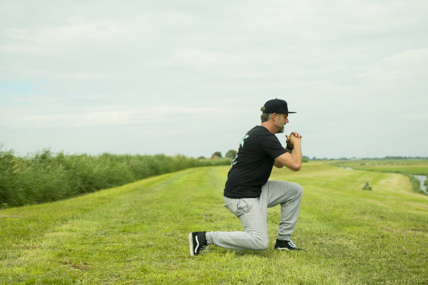 beenspieroefening in het gras